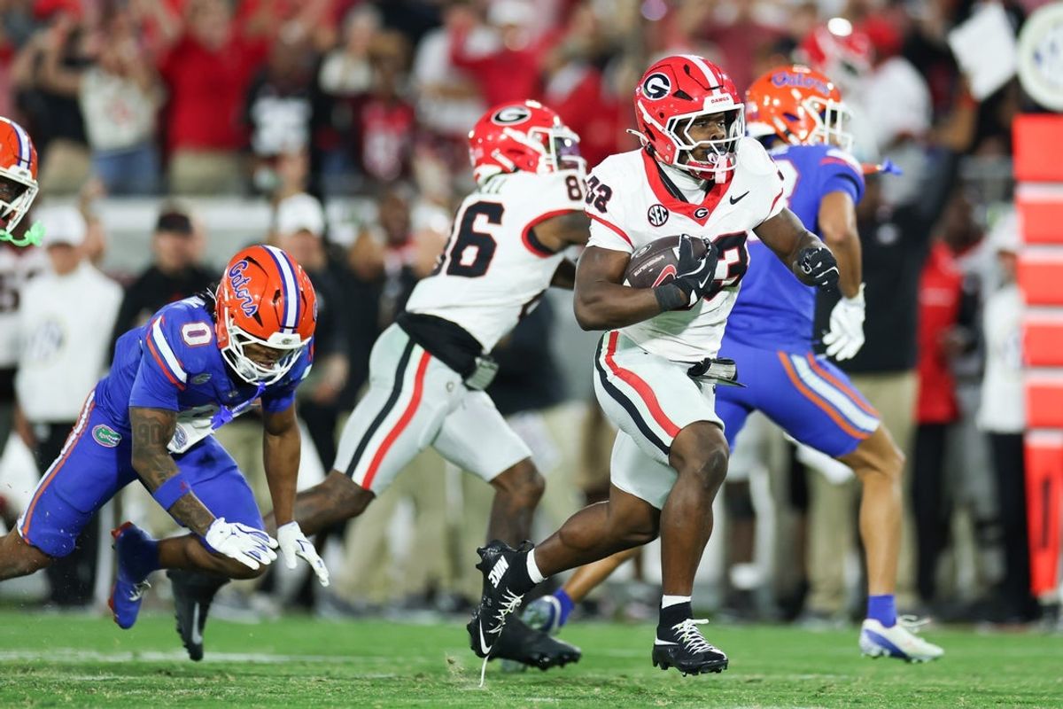 Nov 1, 2025; Jacksonville, Florida, USA; Georgia Bulldogs running back Chauncey Bowens (33) runs the ball in the second half against the Florida Gators at EverBank Stadium. Mandatory Credit: Matt Pendleton-Imagn Images