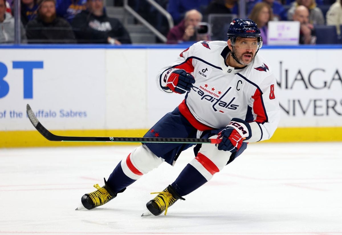Nov 1, 2025; Buffalo, New York, USA;  Washington Capitals left wing Alex Ovechkin (8) looks for the puck during the first period against the Buffalo Sabres at KeyBank Center. Mandatory Credit: Timothy T. Ludwig-Imagn Images