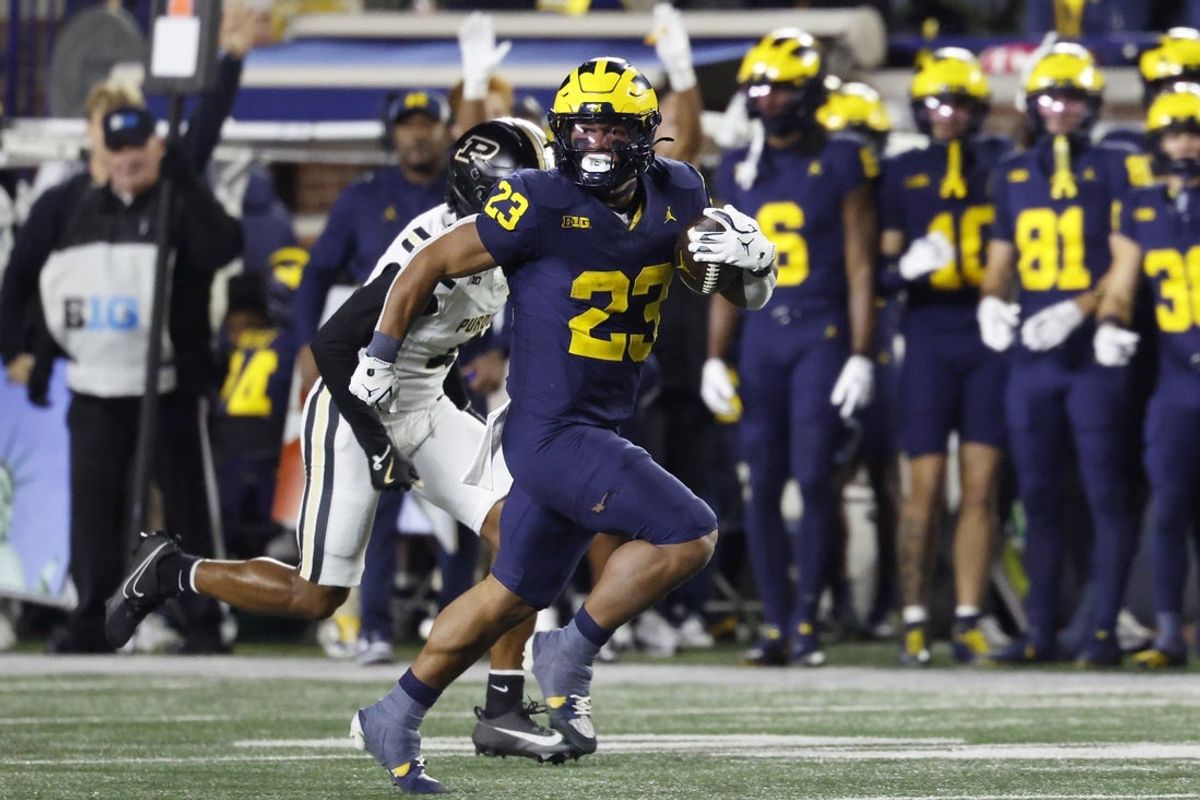 Nov 1, 2025; Ann Arbor, Michigan, USA;  Michigan Wolverines running back Jordan Marshall (23) rushes for a touchdown in the first half against the Purdue Boilermakers at Michigan Stadium. Mandatory Credit: Rick Osentoski-Imagn Images
