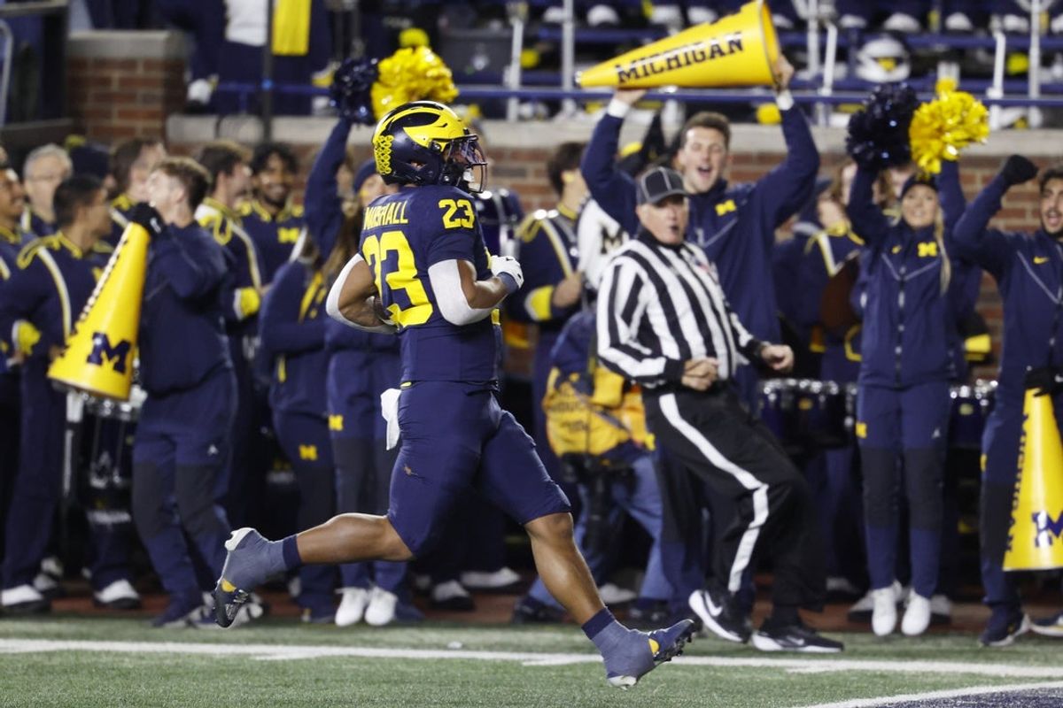 Nov 1, 2025; Ann Arbor, Michigan, USA;  Michigan Wolverines running back Jordan Marshall (23) rushes for a touchdown in the first half against the Purdue Boilermakers at Michigan Stadium. Mandatory Credit: Rick Osentoski-Imagn Images
