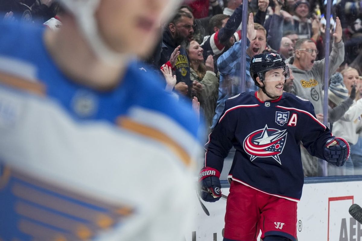 Nov 1, 2025; Columbus, Ohio, USA;  Columbus Blue Jackets defenseman Zach Werenski (8) reacts to scoring a goal against the St. Louis Blues in the second period at Nationwide Arena. Mandatory Credit: Aaron Doster-Imagn Images