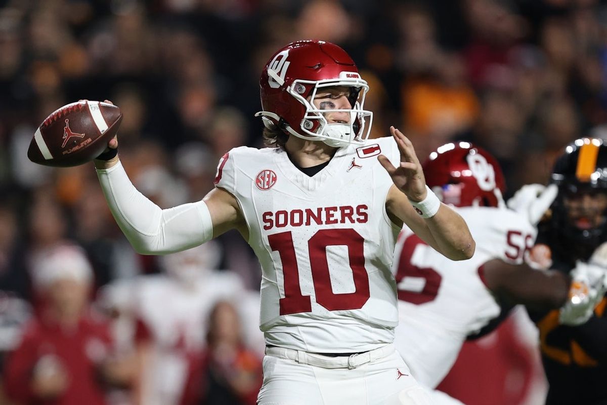 Nov 1, 2025; Knoxville, Tennessee, USA; Oklahoma Sooners quarterback John Mateer (10) passes the ball against the Tennessee Volunteers during the first quarter at Neyland Stadium. Mandatory Credit: Randy Sartin-Imagn Images