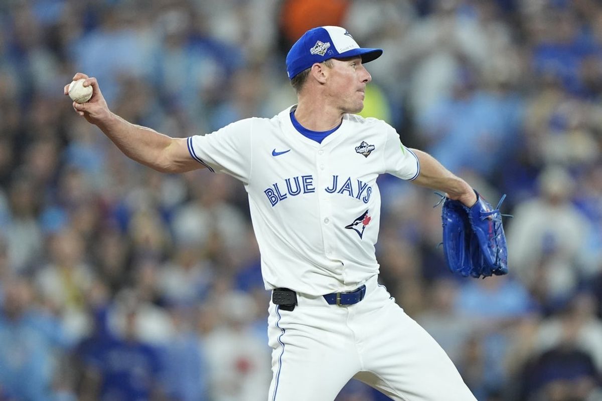 Nov 1, 2025; Toronto, Ontario, CAN; Toronto Blue Jays pitcher Chris Bassitt (40) throws to second for an out against Los Angeles Dodgers third baseman Max Muncy (13) in the sixth inning during game seven of the 2025 MLB World Series at Rogers Centre. Mandatory Credit: John E. Sokolowski-Imagn Images