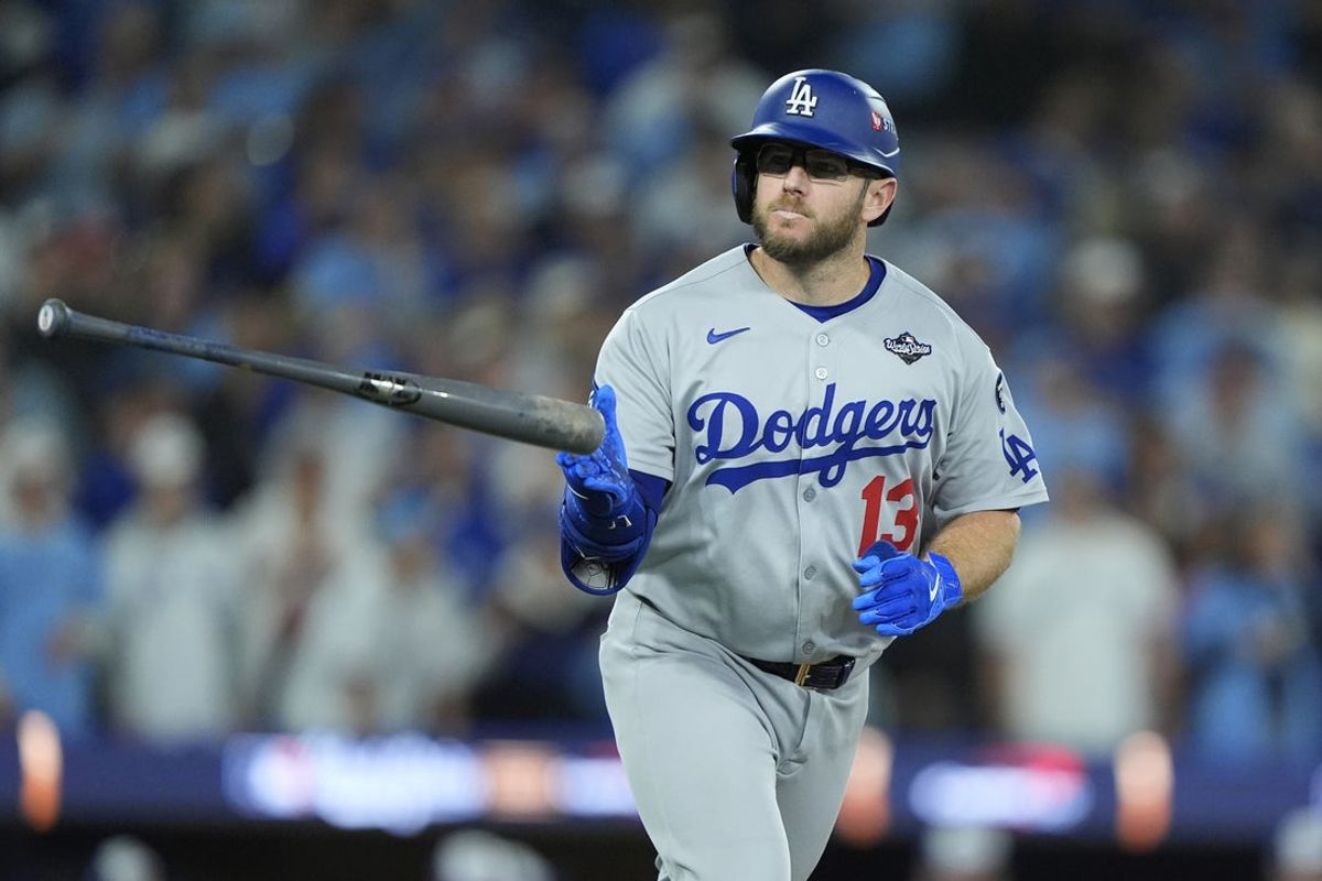 Nov 1, 2025; Toronto, Ontario, CAN; Los Angeles Dodgers third baseman Max Muncy (13) runs after hitting a home run against the Toronto Blue Jays in the eighth inning during game seven of the 2025 MLB World Series at Rogers Centre. Mandatory Credit: John E. Sokolowski-Imagn Images