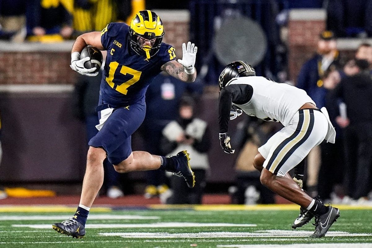 Michigan tight end Marlin Klein (17) makes a catch against Purdue defensive back Hudauri Hines (4) during the second half at Michigan Stadium in Ann Arbor on Saturday, November 1, 2025.