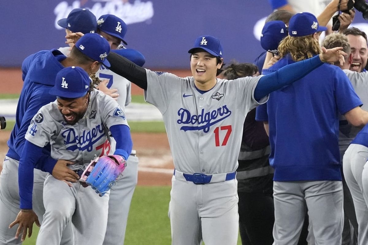 Nov 1, 2025; Toronto, Ontario, CAN; Los Angeles Dodgers two-way player Shohei Ohtani (17) celebrates after defeating the Toronto Blue Jays in game seven of the 2025 MLB World Series at Rogers Centre. Mandatory Credit: Kevin Sousa-Imagn Images
