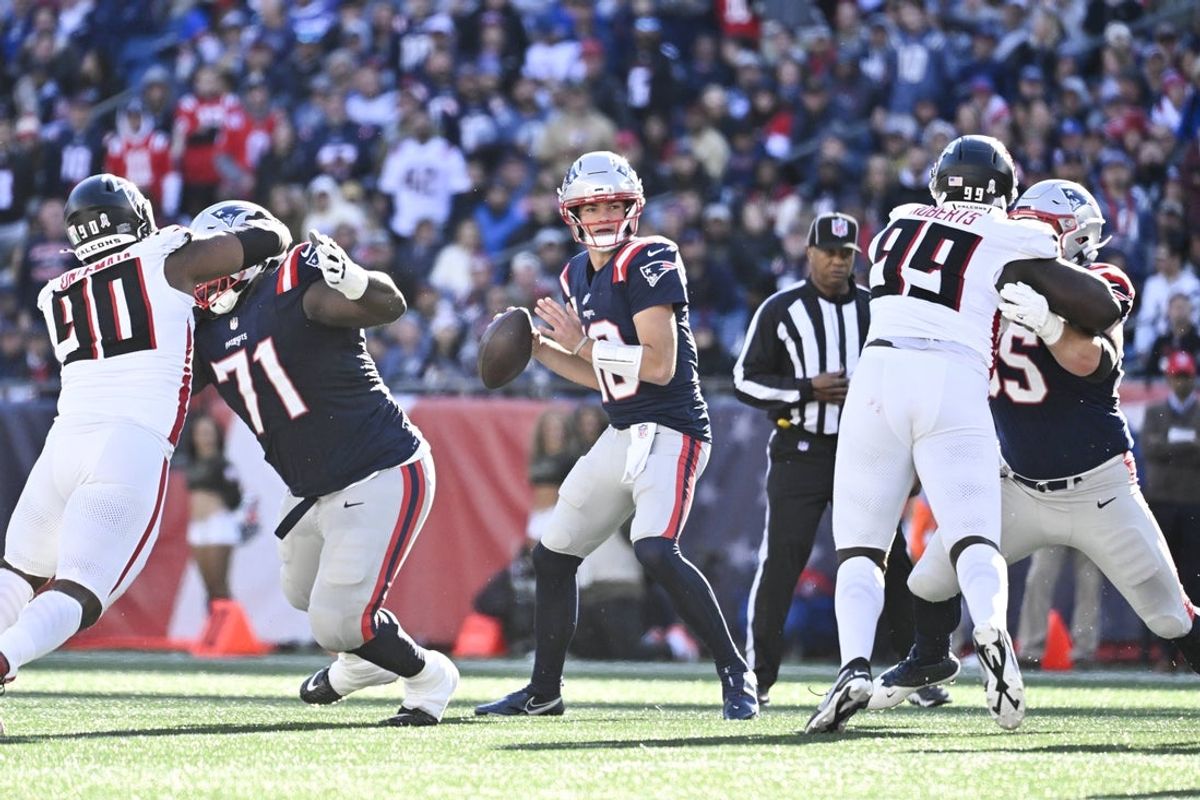 Nov 2, 2025; Foxborough, Massachusetts, USA; New England Patriots quarterback Drake Maye (10) looks to pass against the Atlanta Falcons during the first half at Gillette Stadium. Mandatory Credit: Eric Canha-Imagn Images