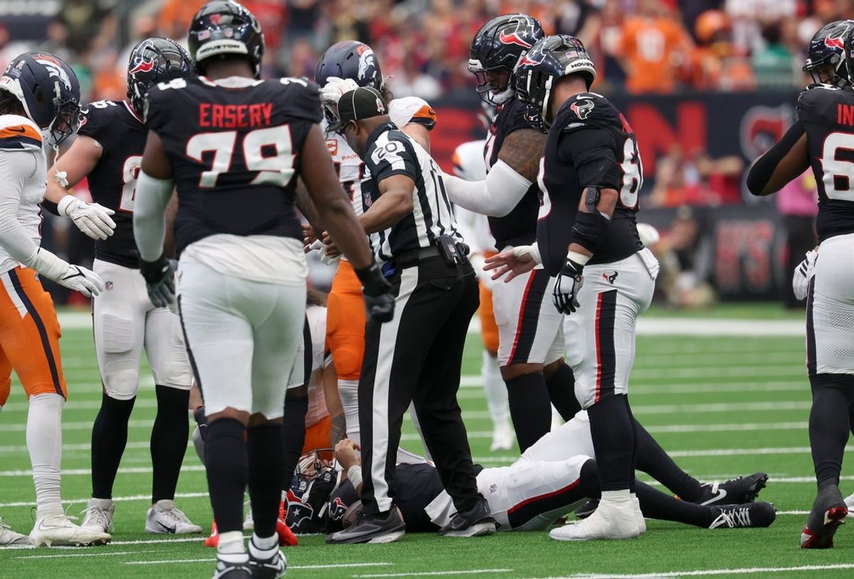 Nov 2, 2025; Houston, Texas, USA; Houston Texans quarterback C.J. Stroud (7) is injured during the first half against the Denver Broncos at NRG Stadium. Mandatory Credit: Thomas Shea-Imagn Images