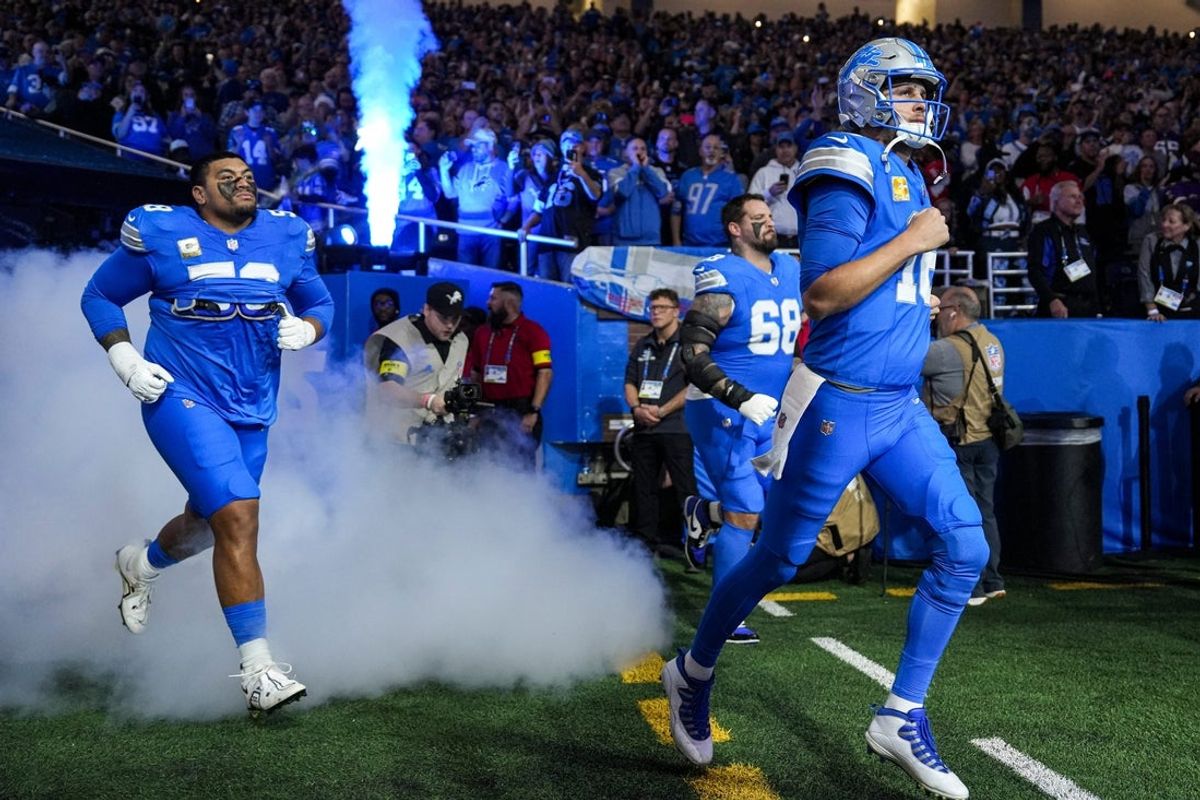 Detroit Lions quarterback Jared Goff (16) leads the team out of the tunnel for first half against Minnesota Vikings at Ford Field in Detroit on Sunday, November 2, 2025.