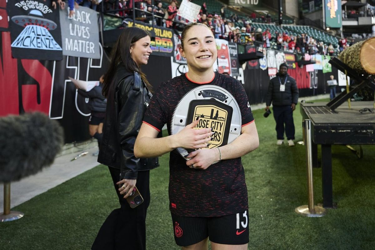 Nov 2, 2025; Portland, Oregon, USA; Portland Thorns FC midfielder Olivia Moultrie (13) was awarded player of the year by fans after a game against the Houston Dash at Providence Park. Mandatory Credit: Troy Wayrynen-Imagn Images