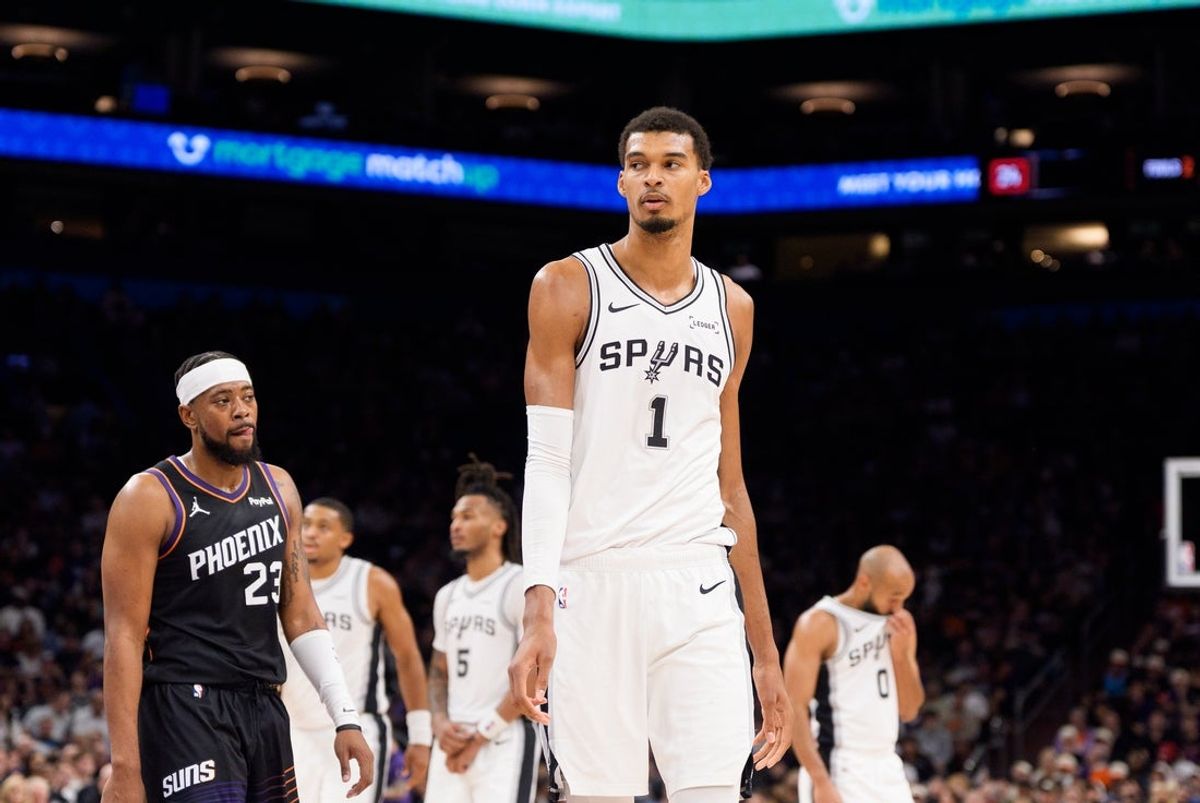 Nov 2, 2025; Phoenix, Arizona, USA; San Antonio Spurs forward Victor Wembanyama (1) gets into position for a free throw during the second half against the Phoenix Suns at Mortgage Matchup Center. Mandatory Credit: Allan Henry-Imagn Images
