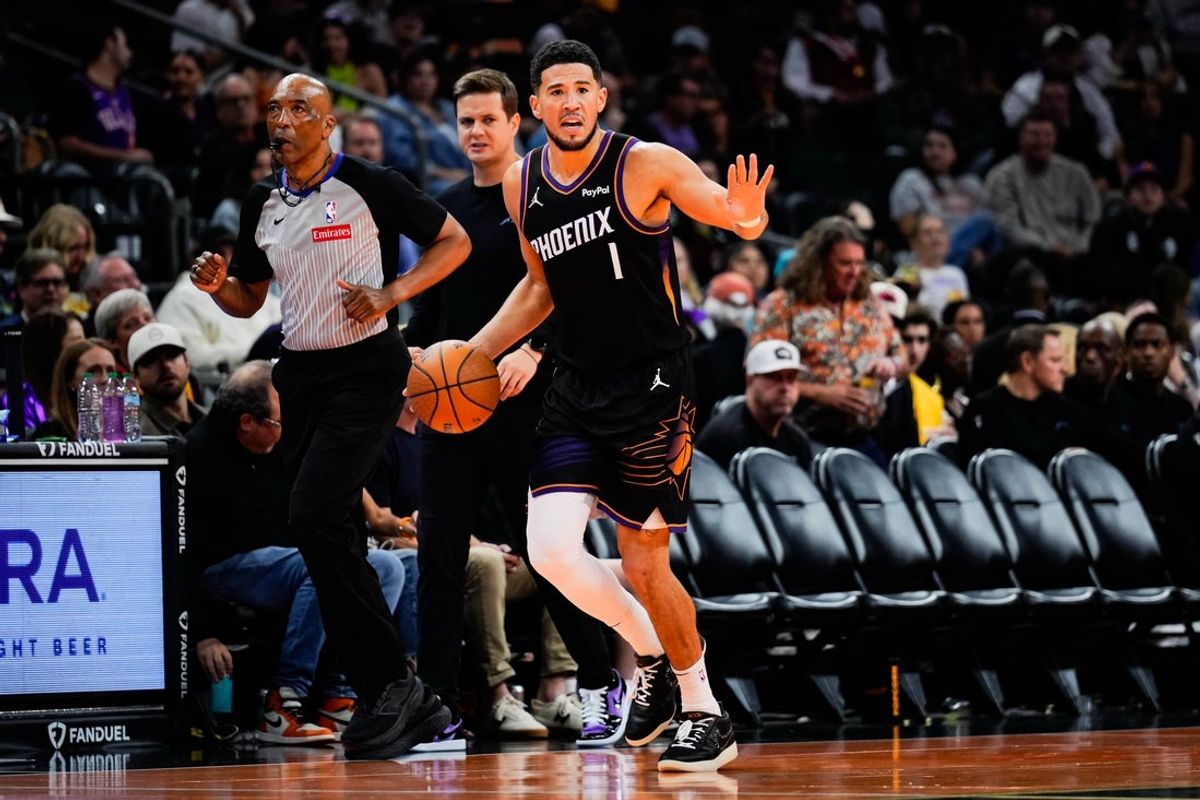 Oct 31, 2025; Phoenix, Arizona, USA;  Phoenix Suns guard Devin Booker (1) in the second half between the Phoenix Suns and the Utah Jazz at Mortgage Matchup Center. Mandatory Credit: Arianna Grainey-Imagn Images