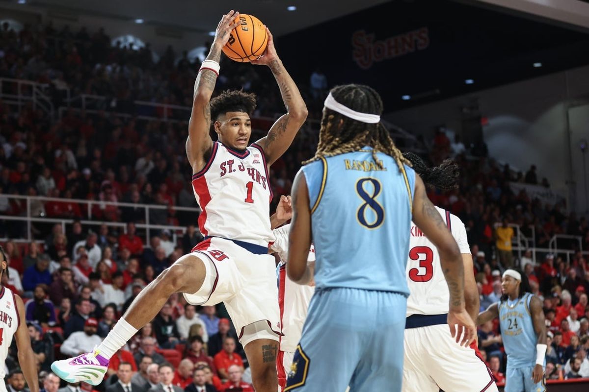Nov 3, 2025; Queens, New York, USA;  St. John's Red Storm forward Dillon Mitchell (1) grabs a rebound in the first half against the Quinnipiac Bobcats at Carnesecca Arena. Mandatory Credit: Wendell Cruz-Imagn Images