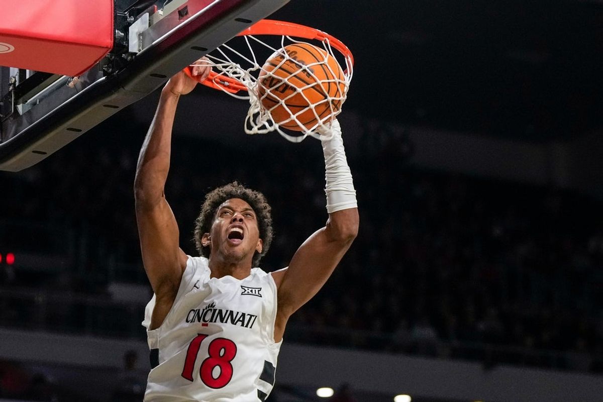 Cincinnati Bearcats forward Baba Miller (18) dunks in the first half of the NCAA men’s basketball game between the Cincinnati Bearcats and the Western Carolina Catamounts at Fifth Third Arena in Cincinnati on Monday, Nov. 3, 2025.