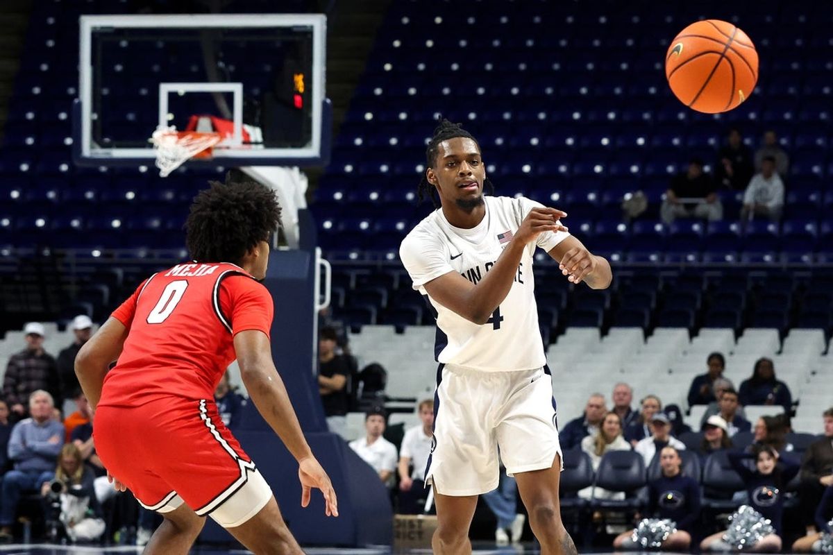 Nov 3, 2025; University Park, Pennsylvania, USA; Penn State Nittany Lions guard Kayden Mingo (4) passes the ball during the first half against the Fairfield Stags at Bryce Jordan Center. Mandatory Credit: Matthew O'Haren-Imagn Images