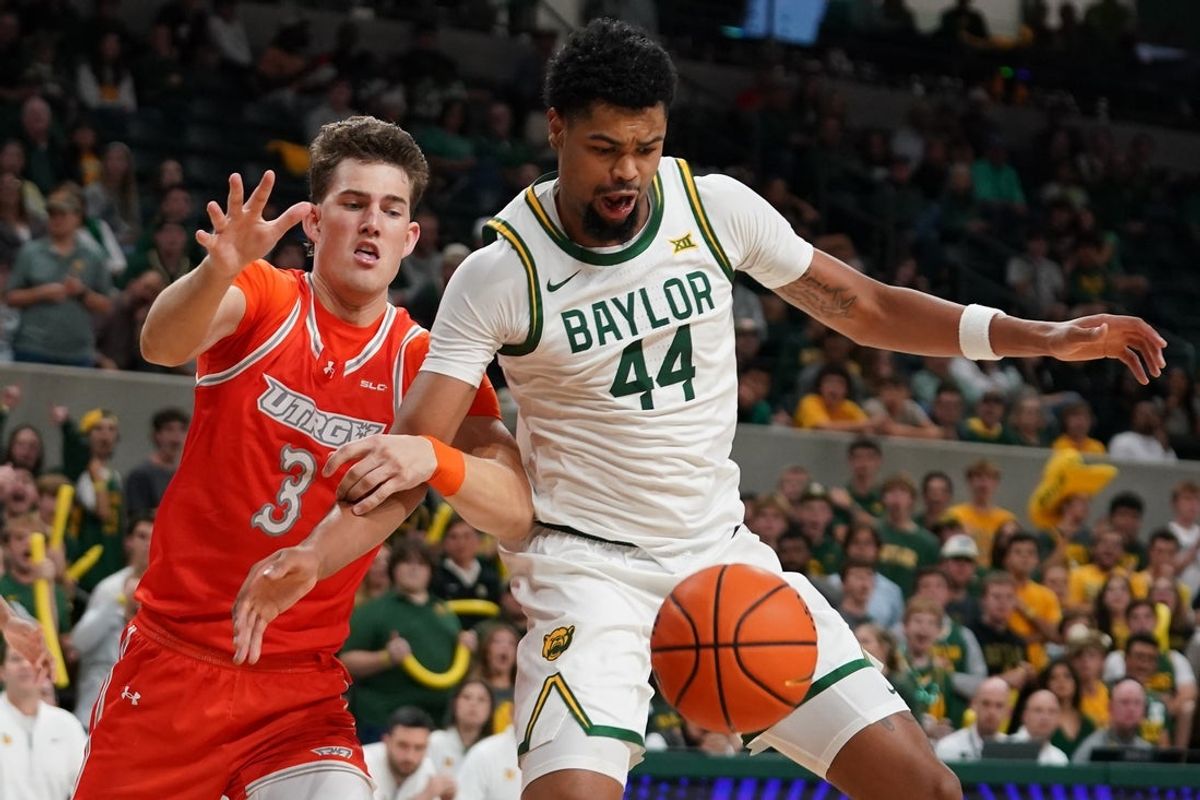 Nov 3, 2025; Waco, Texas, USA; Baylor Bears center Caden Powell (44) and UT Rio Grande Valley Vaqueros forward Dane Christensen (3) battle for the rebound during the first half at Paul and Alejandra Foster Pavilion. Mandatory Credit: Raymond Carlin III-Imagn Images