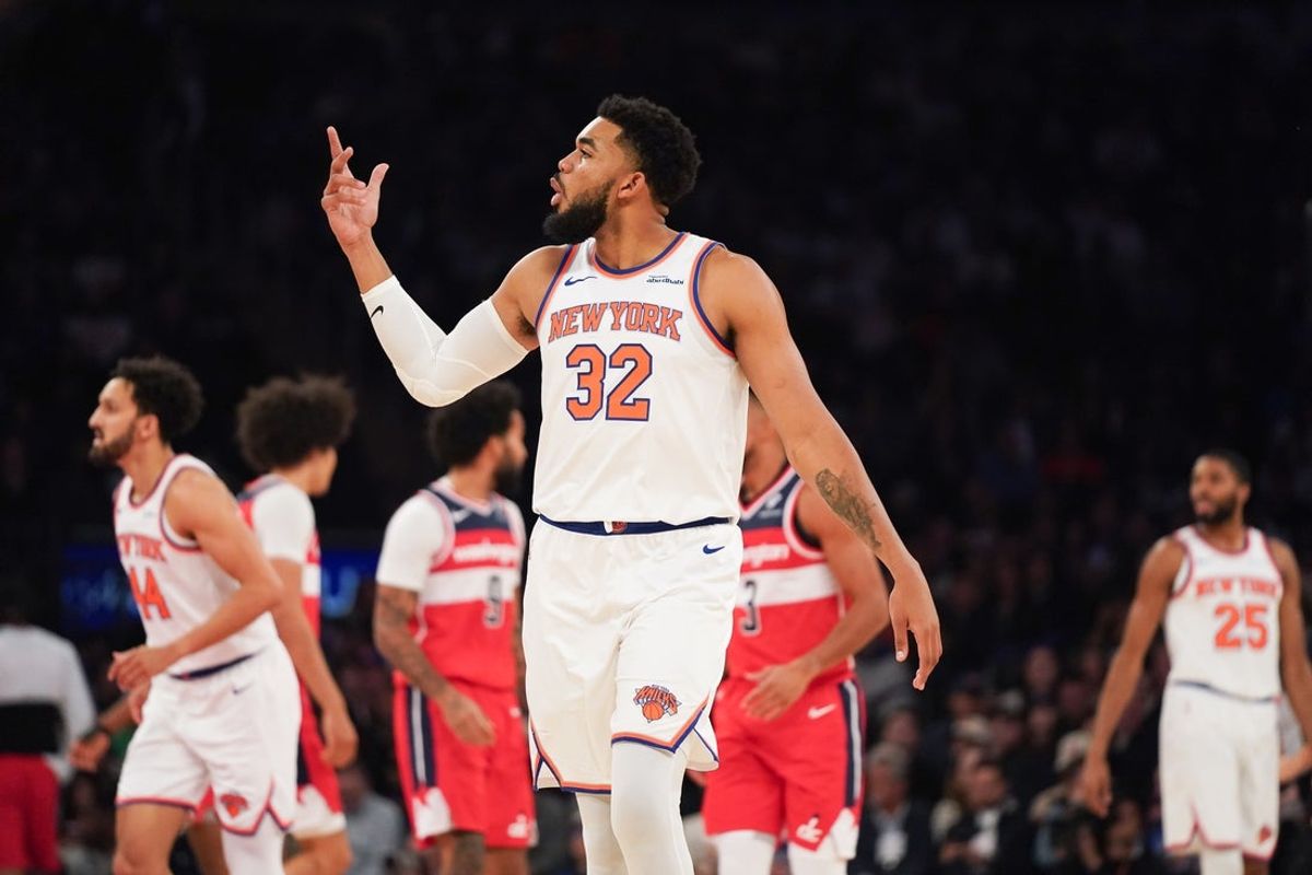 Nov 3, 2025; New York, New York, USA; New York Knicks center Karl-Anthony Towns (32) reacts during the first half against the Washington Wizards at Madison Square Garden. Mandatory Credit: Lucas Boland-Imagn Images