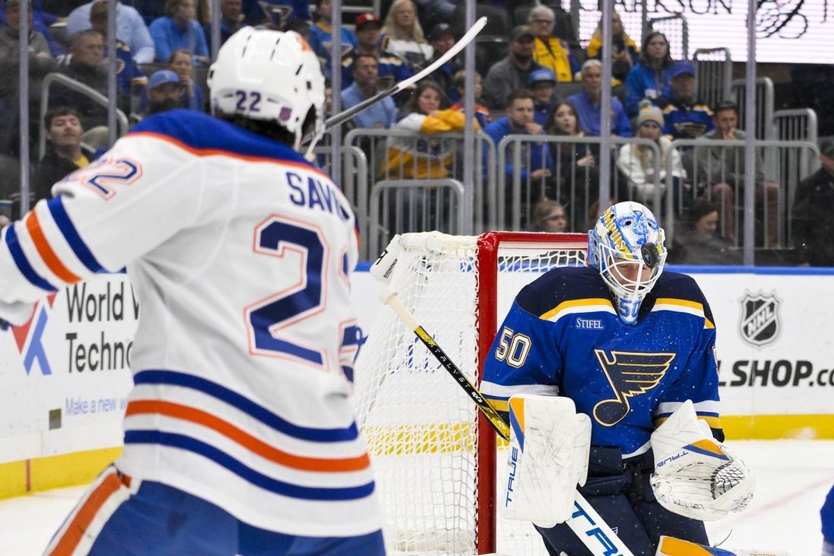 Nov 3, 2025; St. Louis, Missouri, USA; St. Louis Blues goaltender Jordan Binnington (50) makes a save against Edmonton Oilers center Matt Savoie (22) during the first period at Enterprise Center. Mandatory Credit: Jeff Curry-Imagn Images