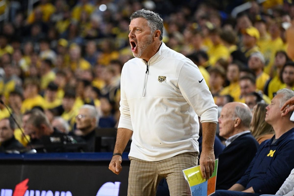 Nov 3, 2025; Ann Arbor, Michigan, USA;  Oakland Golden Grizzlies head coach Greg Kampe yells during the first half  against the Michigan Wolverines at Crisler Center. Mandatory Credit: Lon Horwedel-Imagn Images