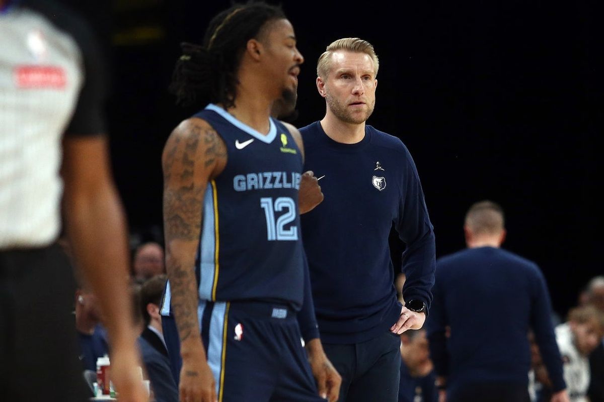 Nov 3, 2025; Memphis, Tennessee, USA; Memphis Grizzlies head coach Tuomas Iisalo looks on as guard Ja Morant (12) checks into the game during the second quarter against the Detroit Pistons at FedExForum. Mandatory Credit: Petre Thomas-Imagn Images