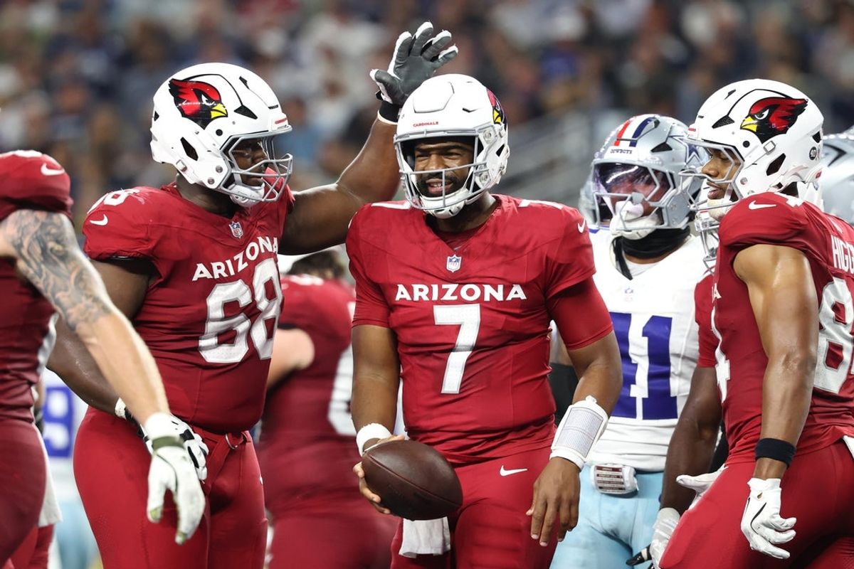 Nov 3, 2025; Arlington, Texas, USA; Arizona Cardinals quarterback Jacoby Brissett (7) celebrates with offensive tackle Kelvin Beachum (68) after scoring a touchdown against the Dallas Cowboys in the first half at AT&T Stadium. Mandatory Credit: Kevin Jairaj-Imagn Images