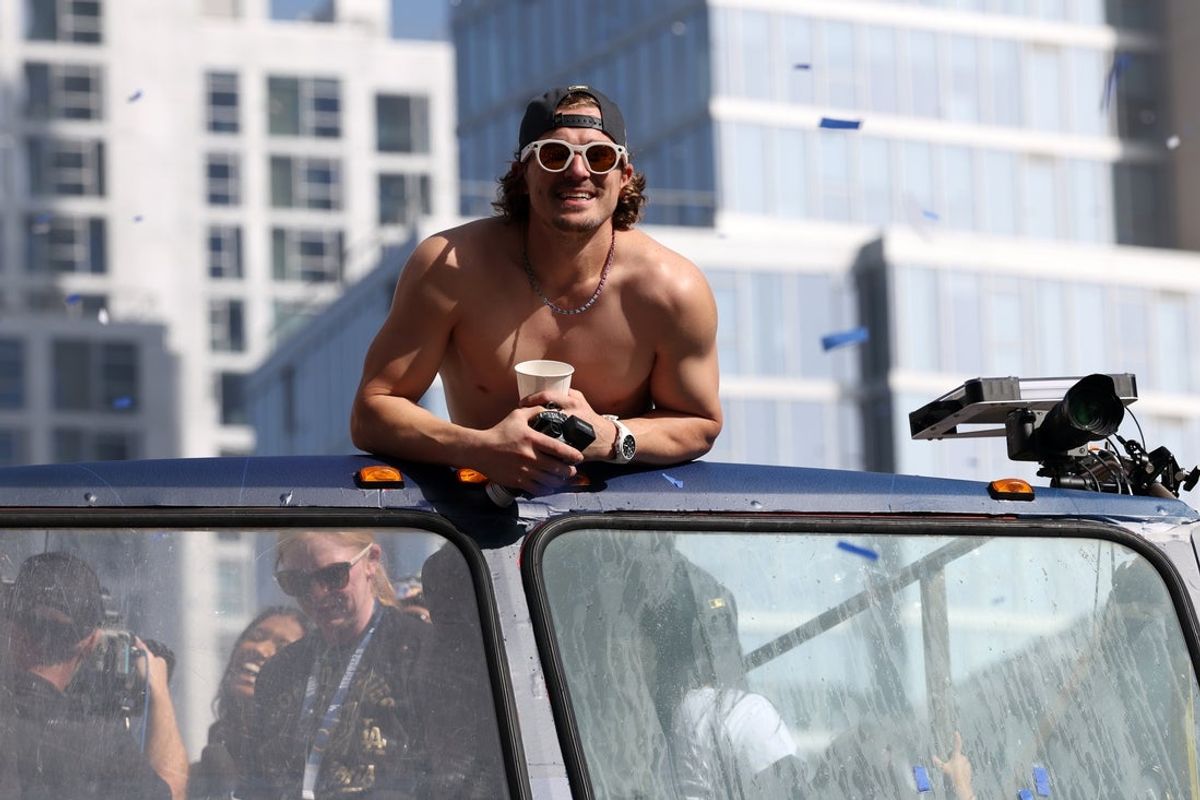 Nov 3, 2025; Los Angeles, CA, USA;  Los Angeles Dodgers first baseman Enrique Hernandez acknowledges the crowd during the World Series championship parade at downtown Los Angeles. Mandatory Credit: Kiyoshi Mio-Imagn Images