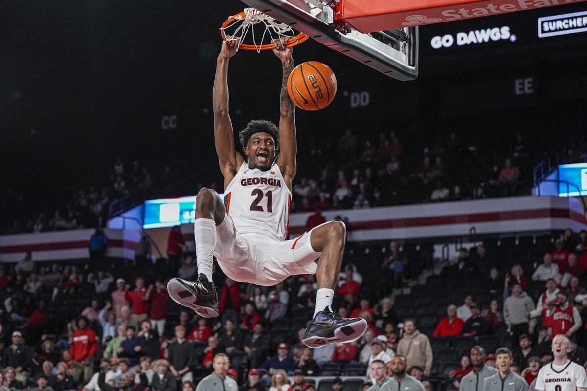 Nov 3, 2025; Athens, Georgia, USA; Georgia Bulldogs forward Jake Wilkins (21) dunks the ball against the Bellarmine Knights during the second half at Stegeman Coliseum. Mandatory Credit: Dale Zanine-Imagn Images