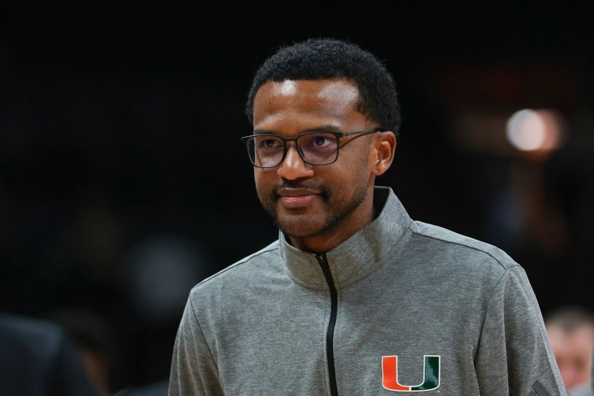 Nov 3, 2025; Coral Gables, Florida, USA; Miami Hurricanes head coach Jai Lucas looks on after the game against the Jacksonville Dolphins at Watsco Center. Mandatory Credit: Sam Navarro-Imagn Images
