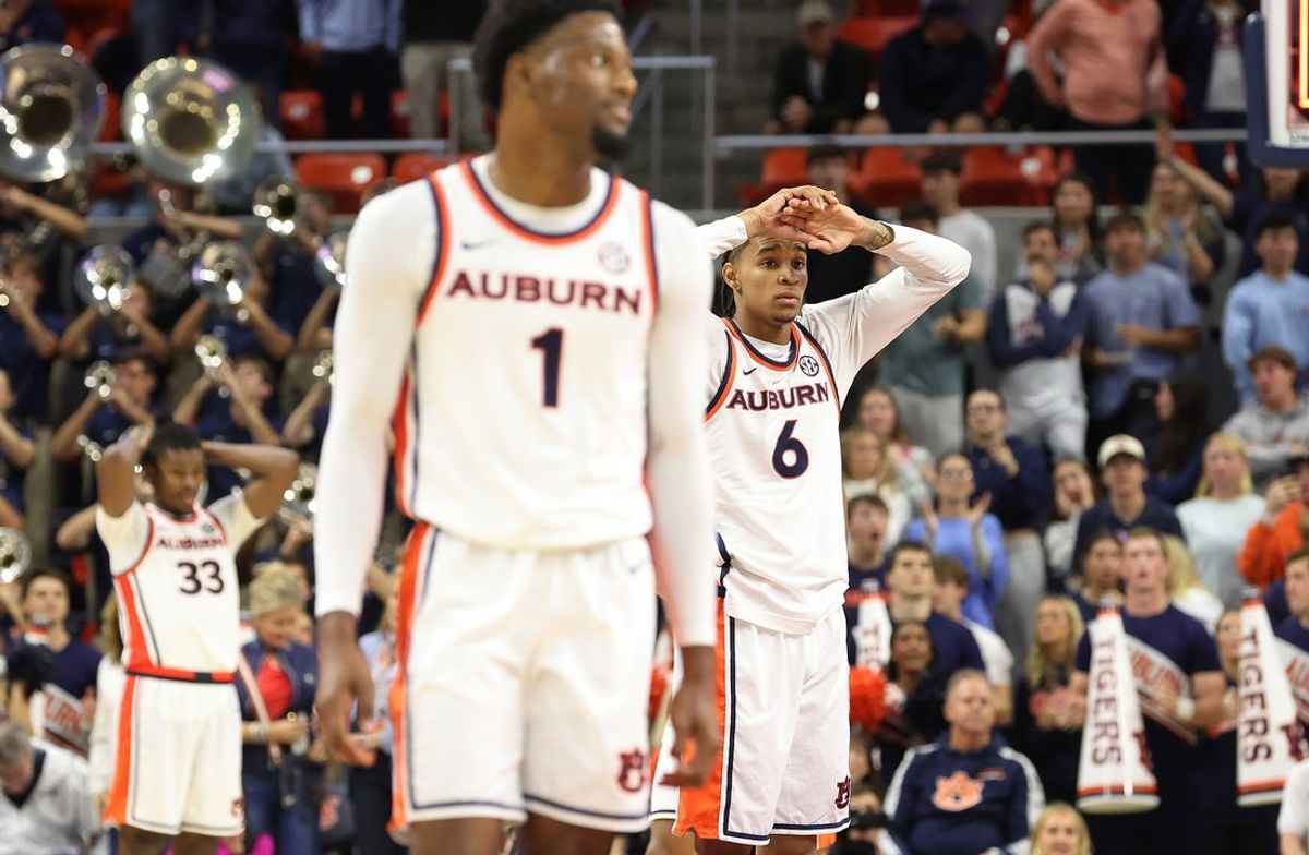 Nov 3, 2025; Auburn, Alabama, USA;  Auburn Tigers guard Elyjah Freeman (6) reacts after fouling Bethune-Cookman Wildcats guard Arterio Morris (1) beyond the 3-point line during the second half at Neville Arena.  Morris would make all 3 shots to send the game into overtime.  Mandatory Credit: John Reed-Imagn Images