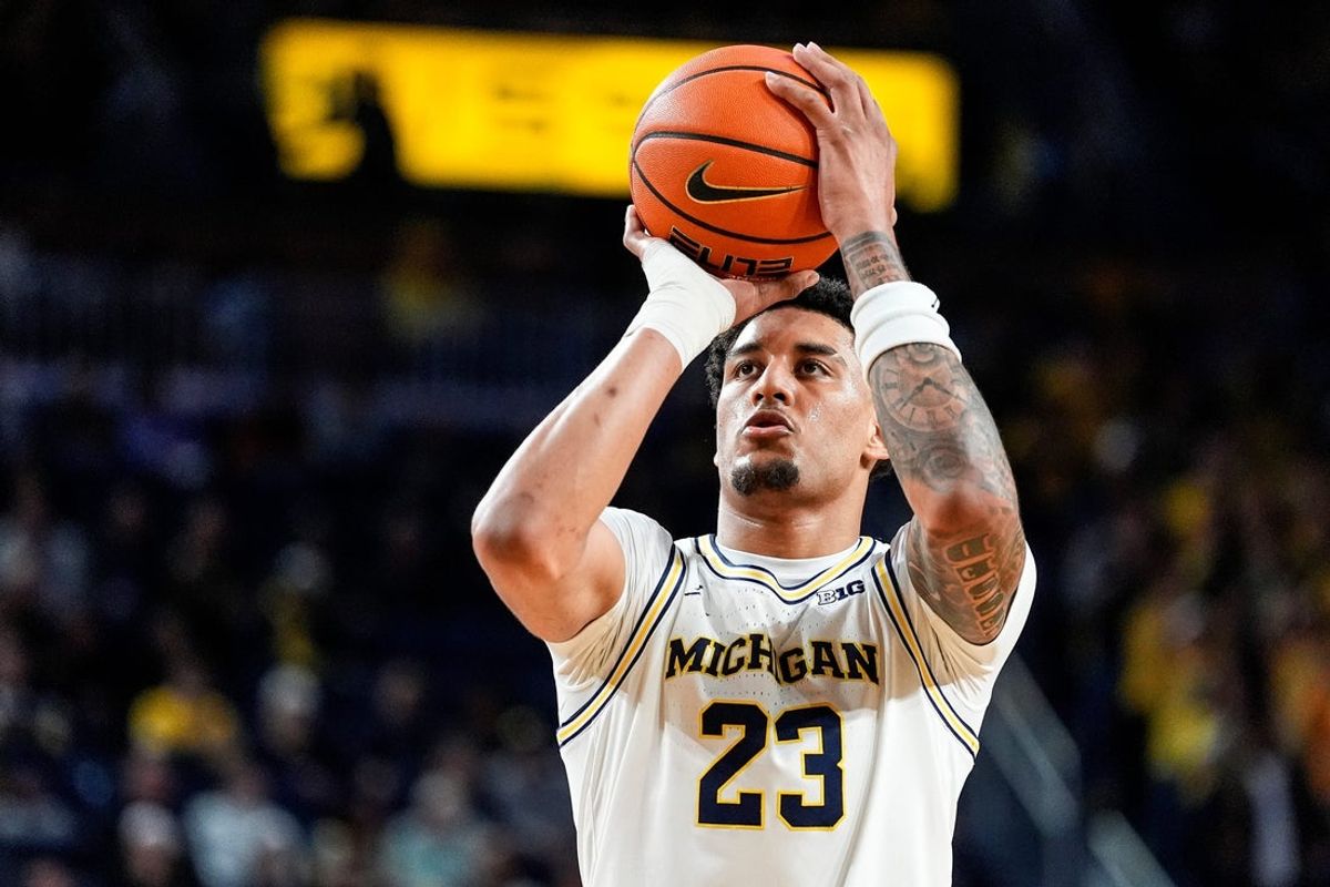 Michigan forward Yaxel Lendeborg (23) attempts a free throw against Oakland during the second half at Crisler Center in Ann Arbor on Monday, November 3, 2025.