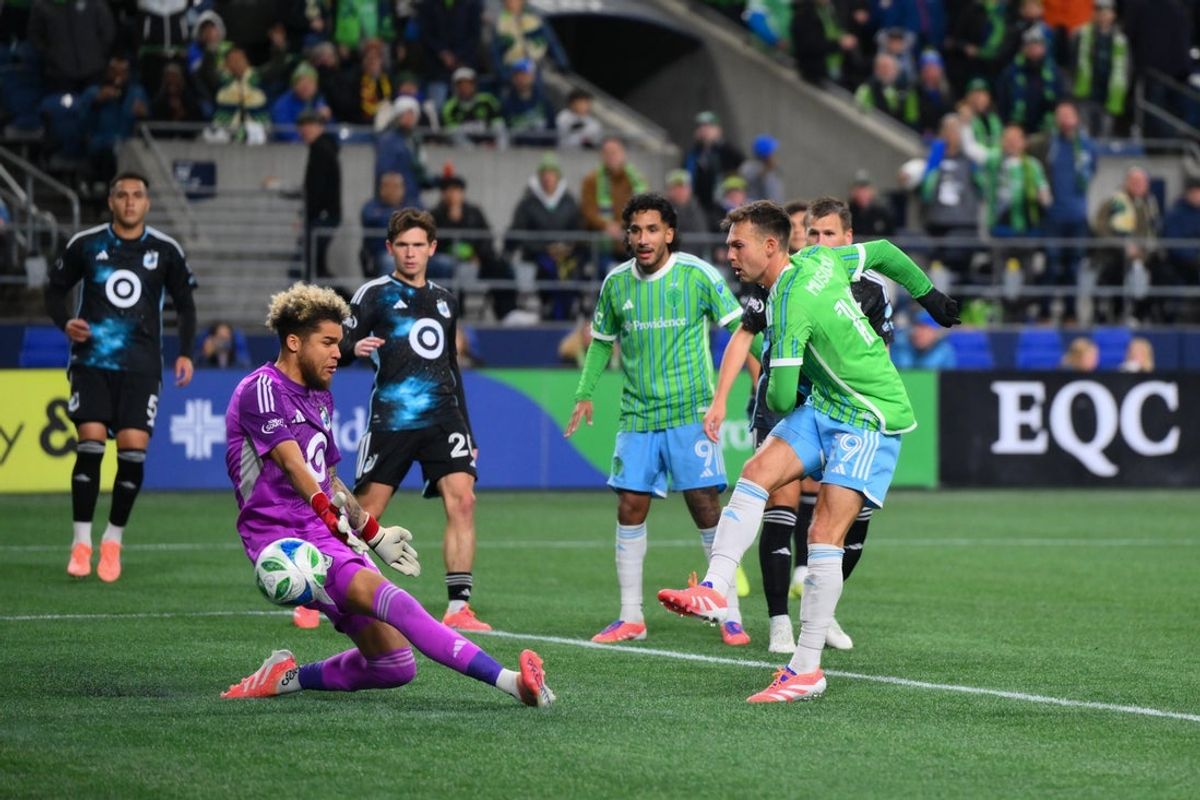 Nov 3, 2025; Seattle, Washington, USA; Seattle Sounders FC forward Danny Musovski (19) scores a goal past Minnesota United goalkeeper Dayne St. Clair (97) during the first half at Lumen Field. Mandatory Credit: Steven Bisig-Imagn Images
