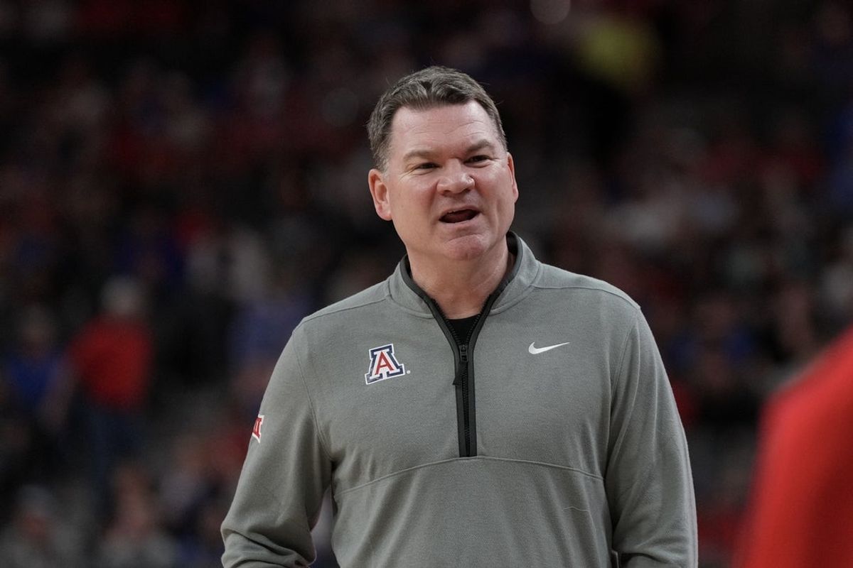 Nov 3, 2025; Las Vegas, NV, USA; Arizona Wildcats head coach Tommy Lloyd looks on during the first half of the Hall of Fame Series game against the Florida Gators at T-Mobile Arena. Mandatory Credit: Candice Ward-Imagn Images