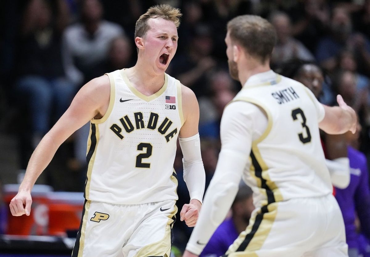 Purdue Boilermakers guard Fletcher Loyer (2) yells in excitement with Purdue Boilermakers guard Braden Smith (3) after scoring a three-point basket Tuesday, Nov. 4, 2025, during the game at Mackey Arena in West Lafayette. The Purdue Boilermakers defeated the Evansville Purple Aces, 82-51.