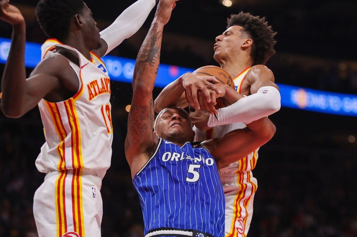 Nov 4, 2025; Atlanta, Georgia, USA; Atlanta Hawks forward Jalen Johnson (1) steals the ball from Orlando Magic forward Paolo Banchero (5) in the first quarter at State Farm Arena. Mandatory Credit: Brett Davis-Imagn Images