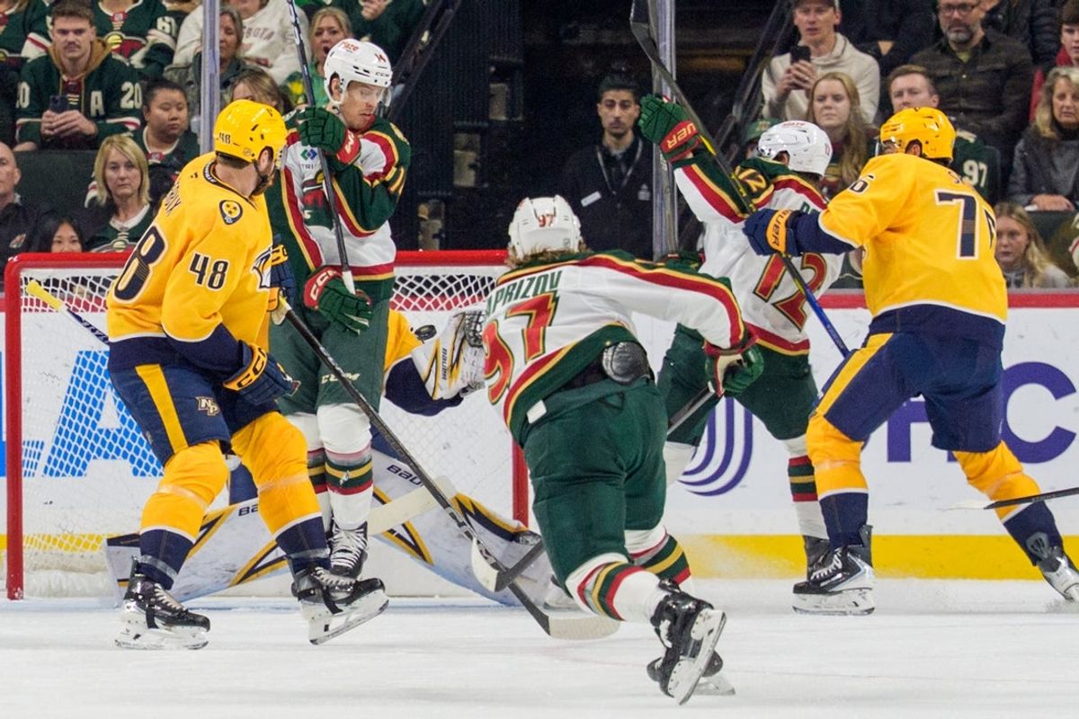 Nov 4, 2025; Saint Paul, Minnesota, USA; A shot by Minnesota Wild left wing Kirill Kaprizov (97) goes just over the arm of Nashville Predators goaltender Justus Annunen (29) to score in the first period at Grand Casino Arena. Mandatory Credit: Matt Blewett-Imagn Images