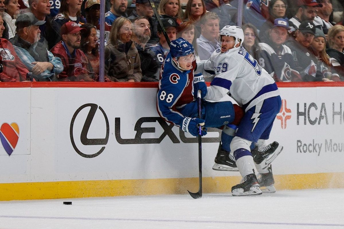Nov 4, 2025; Denver, Colorado, USA; Colorado Avalanche center Martin Necas (88) gets tied up with Tampa Bay Lightning center Jake Guentzel (59) in the first period at Ball Arena. Mandatory Credit: Isaiah J. Downing-Imagn Images