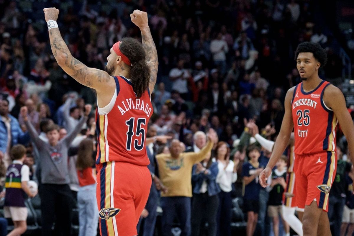 Nov 4, 2025; New Orleans, Louisiana, USA; New Orleans Pelicans guard Jose Alvarado (15) celebrates a score with forward Trey Murphy III (25) during the fourth quarter against the Charlotte Hornets at Smoothie King Center. Mandatory Credit: Matthew Hinton-Imagn Images