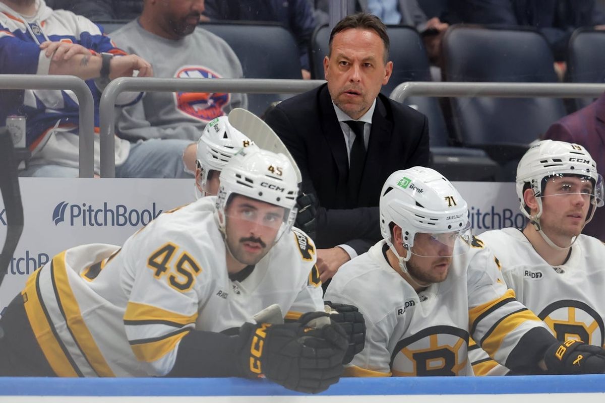 Nov 4, 2025; Elmont, New York, USA; Boston Bruins head coach Marco Sturm coaches against the New York Islanders during the second period at UBS Arena. Mandatory Credit: Brad Penner-Imagn Images