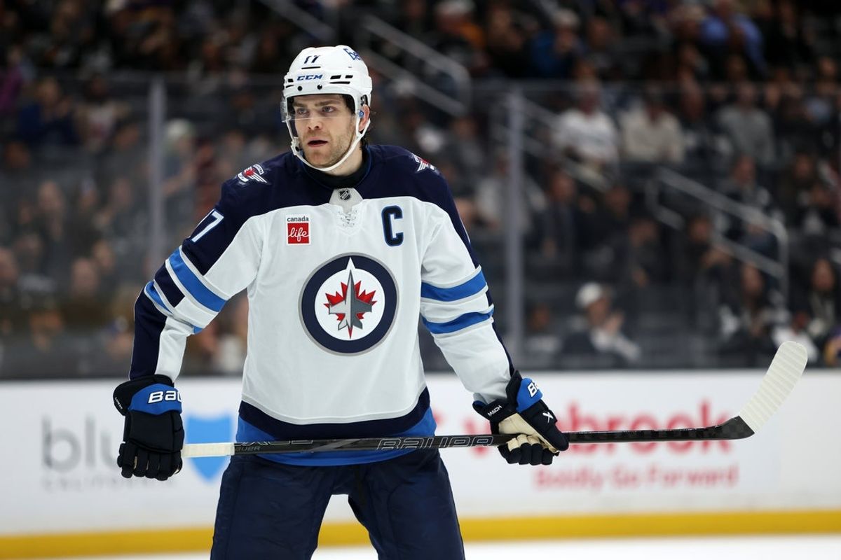 Nov 4, 2025; Los Angeles, California, USA;  Winnipeg Jets center Adam Lowry (17) looks on during the third period against the Los Angeles Kings at Crypto.com Arena. Mandatory Credit: Kiyoshi Mio-Imagn Images