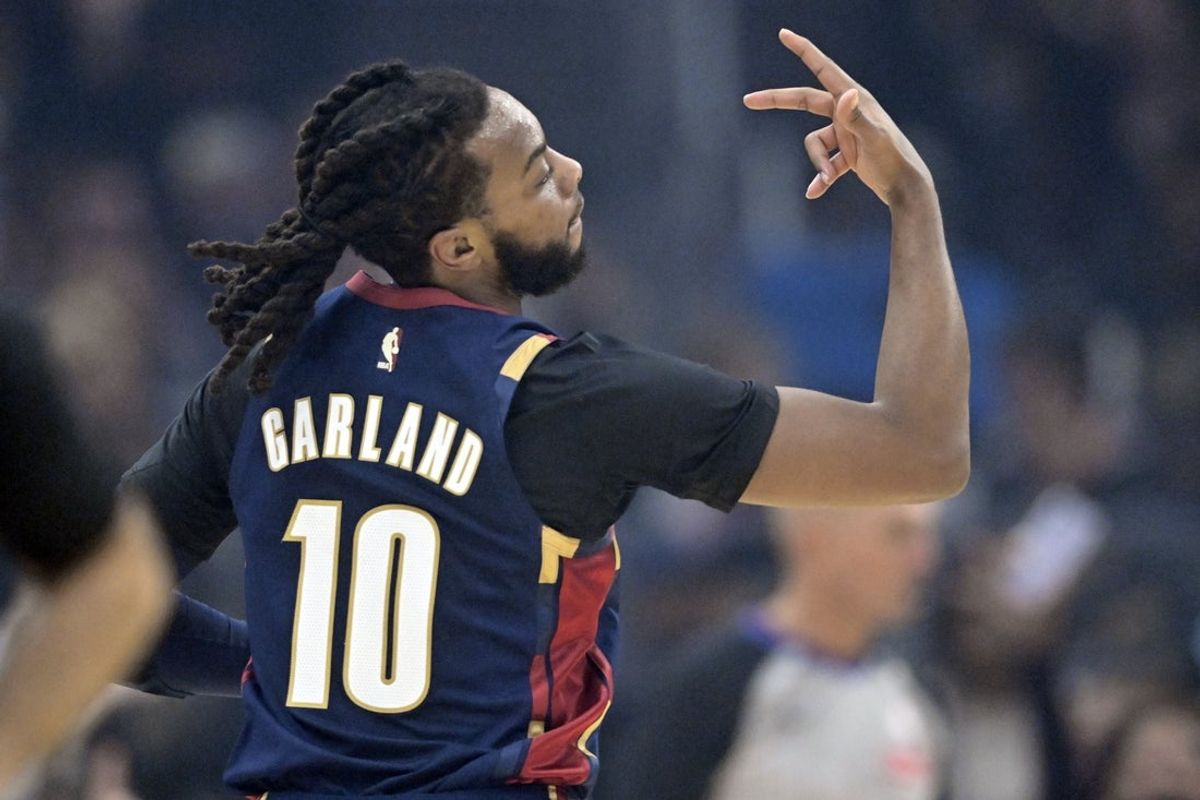 Nov 5, 2025; Cleveland, Ohio, USA; Cleveland Cavaliers guard Darius Garland (10) celebrates his three-point basket in the first quarter against the Philadelphia 76ers at Rocket Arena. Mandatory Credit: David Richard-Imagn Images