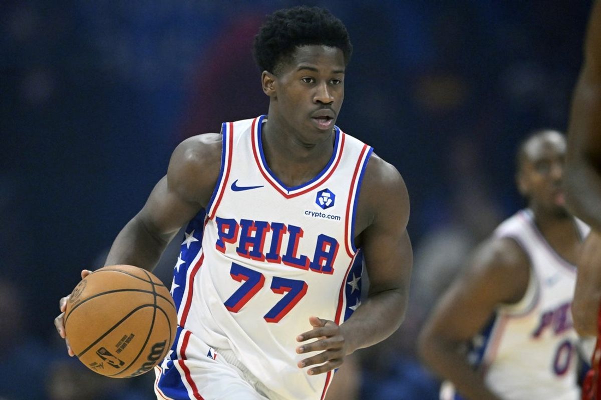 Nov 5, 2025; Cleveland, Ohio, USA; Philadelphia 76ers guard VJ Edgecombe (77) brings the ball up court in the first quarter against the Cleveland Cavaliers at Rocket Arena. Mandatory Credit: David Richard-Imagn Images