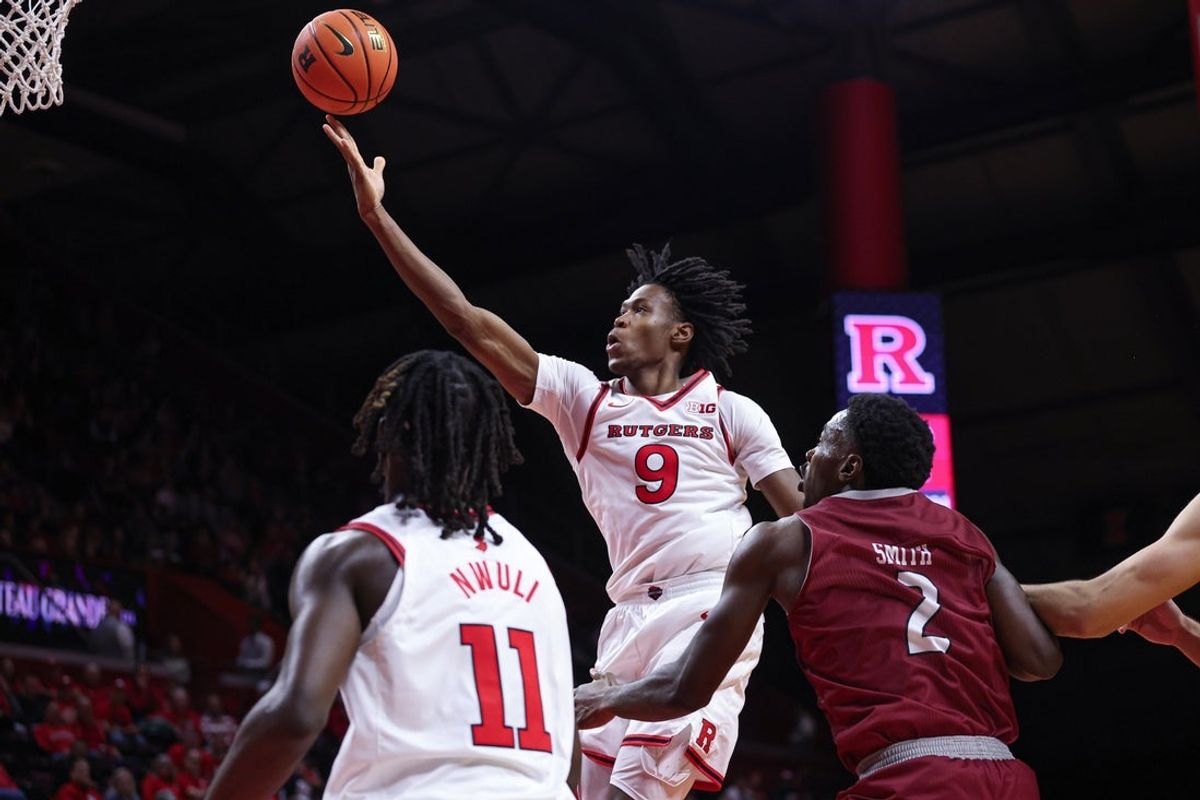 Nov 5, 2025; Piscataway, New Jersey, USA; Rutgers Scarlet Knights forward Dylan Grant (9) goes to the basket during the second half against Rider Broncs guard Caleb Smith (2) at Jersey Mike's Arena. Mandatory Credit: Vincent Carchietta-Imagn Images