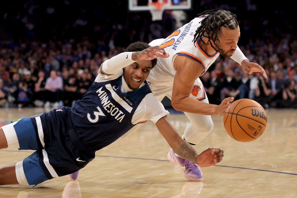 Nov 5, 2025; New York, New York, USA; Minnesota Timberwolves forward Jaden McDaniels (3) fouls New York Knicks guard Jalen Brunson (11) as they chase after a loose ball during the second quarter at Madison Square Garden. Mandatory Credit: Brad Penner-Imagn Images