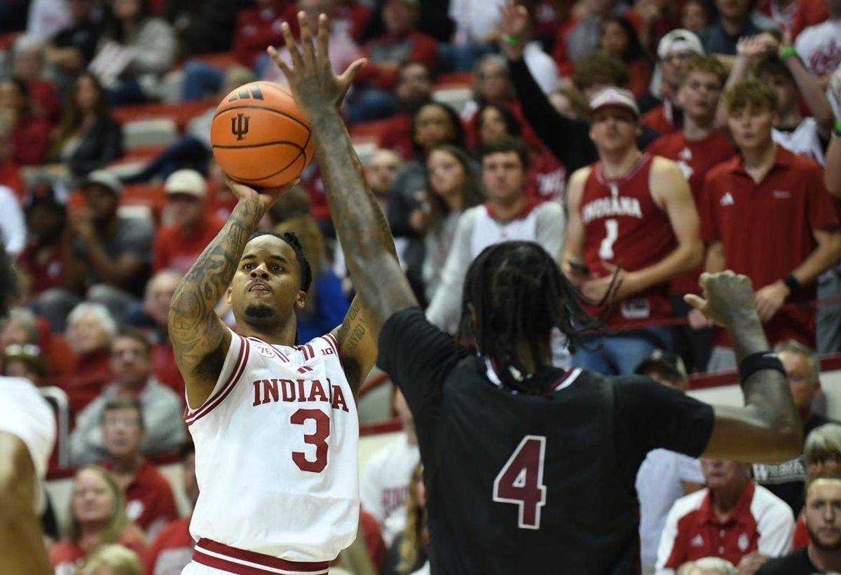 Nov 5, 2025; Bloomington, Indiana, USA; Indiana Hoosiers guard Lamar Wilkerson (3) shoots the ball over Alabama A&M Bulldogs guard Gabe Kincy (4) during the first half at Simon Skjodt Assembly Hall. Mandatory Credit: Robert Goddin-Imagn Images