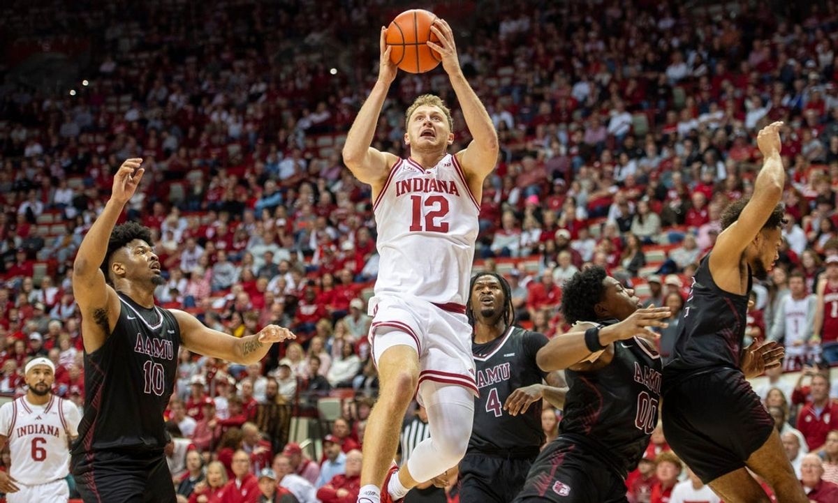 Indiana's Tucker DeVries (12) scores during the Indiana versus Alabama A&M men's basketball game at Simon Skjodt Assembly Hall on Wednesday, Nov. 5, 2025.