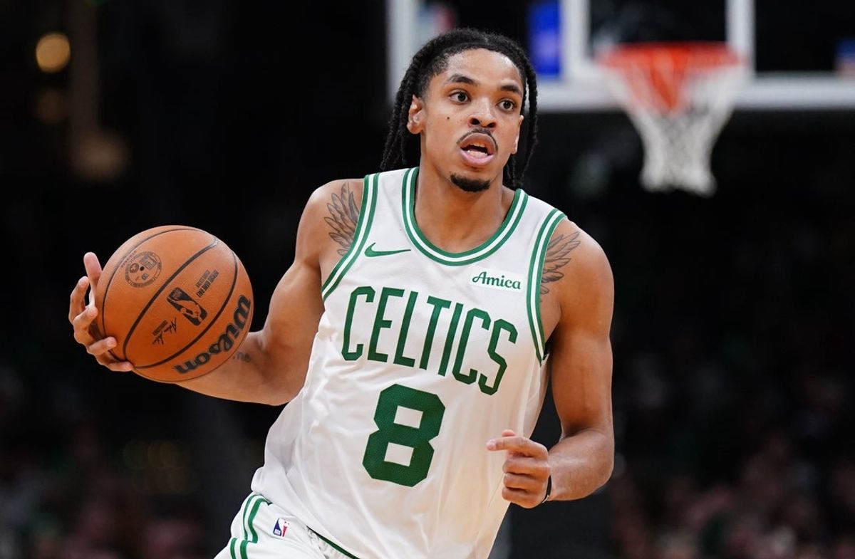 Nov 5, 2025; Boston, Massachusetts, USA; Boston Celtics forward Josh Minott (8) returns the ball against the Washington Wizards in the second half at TD Garden. Mandatory Credit: David Butler II-Imagn Images