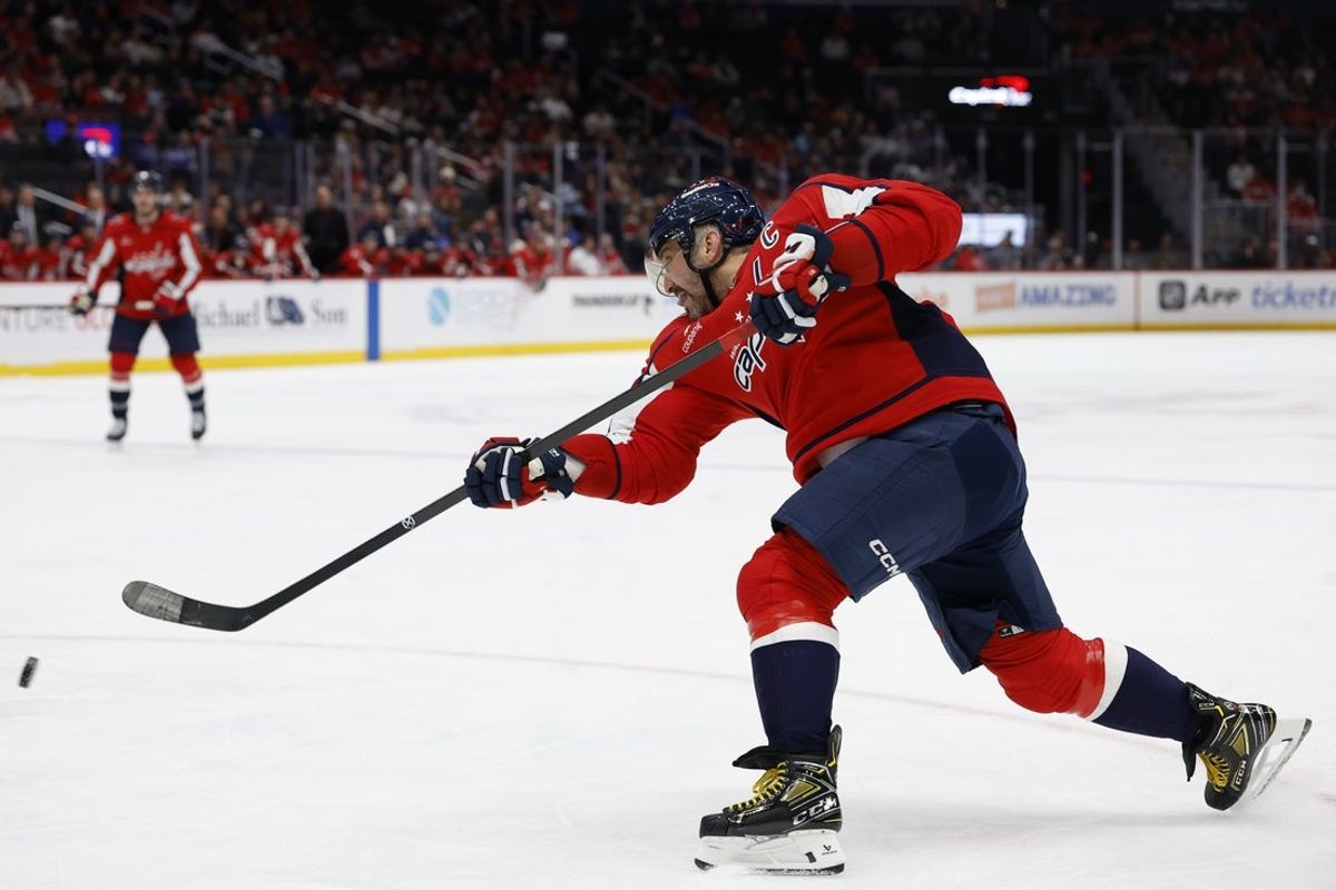 Nov 5, 2025; Washington, District of Columbia, USA; Washington Capitals left wing Alex Ovechkin (8) shoots the puck against the St. Louis Blues during the third period at Capital One Arena. Mandatory Credit: Geoff Burke-Imagn Images