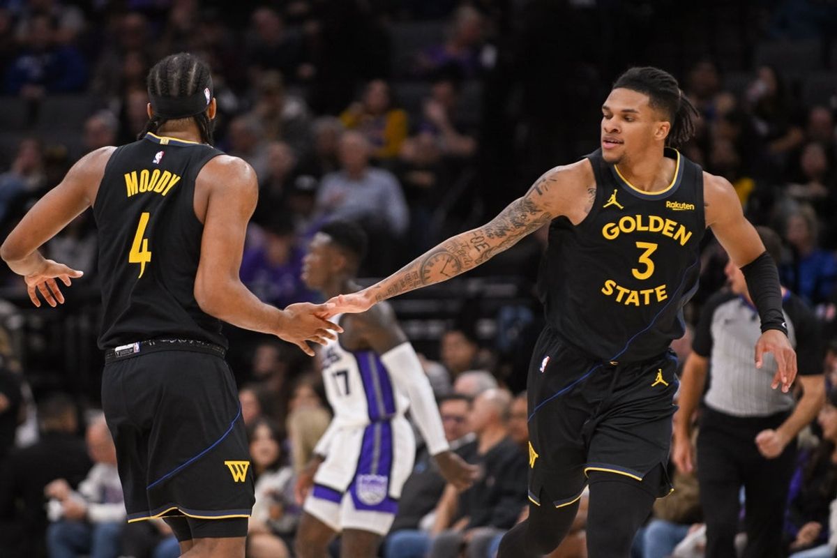 Nov 5, 2025; Sacramento, California, USA; Golden State Warriors guard Moses Moody (4) and guard Will Richard (3) celebrate after scoring against the Sacramento Kings during the second quarter at Golden 1 Center. Mandatory Credit: Ed Szczepanski-Imagn Images