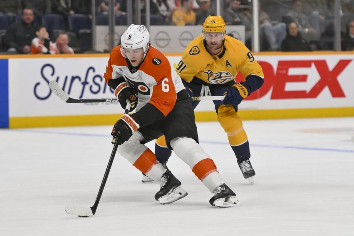 Nov 6, 2025; Nashville, Tennessee, USA;  Philadelphia Flyers defenseman Travis Sanheim (6) skates with the puck against the Nashville Predators during the first period at Bridgestone Arena. Mandatory Credit: Steve Roberts-Imagn Images