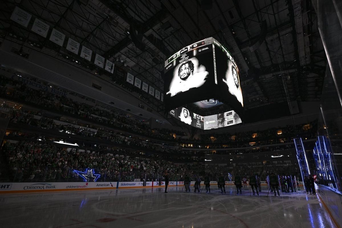 Nov 6, 2025; Dallas, Texas, USA; The Dallas Stars and Anaheim Ducks observe a moment of silence to honor the memory of Dallas Cowboys defensive end Marshawn Kneeland before their game at the American Airlines Center. Mandatory Credit: Jerome Miron-Imagn Images